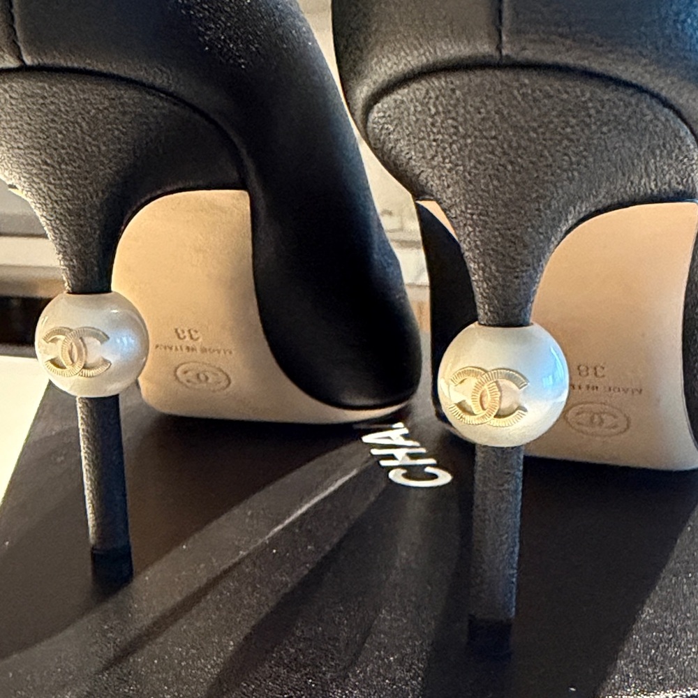 CHANEL Black Leather Pumps with Pearl CC Heel Accent